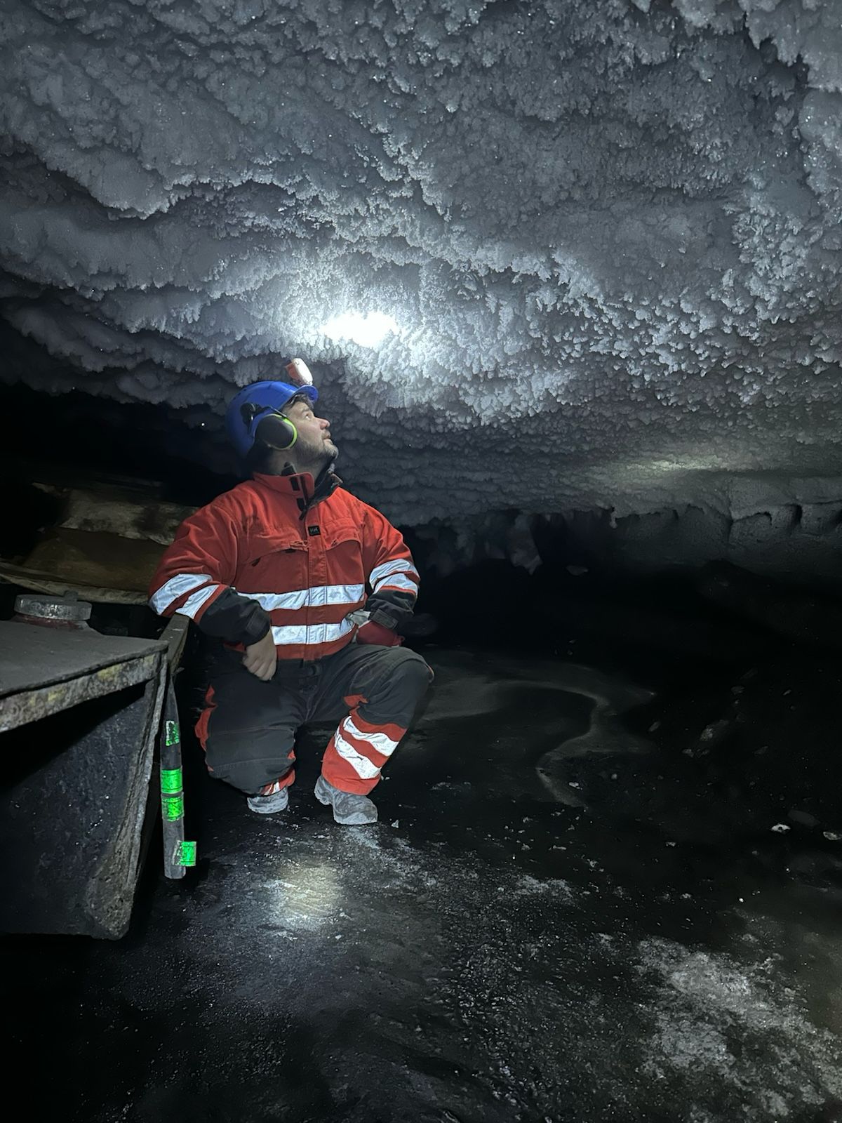 Inside a frost-covered ice cave