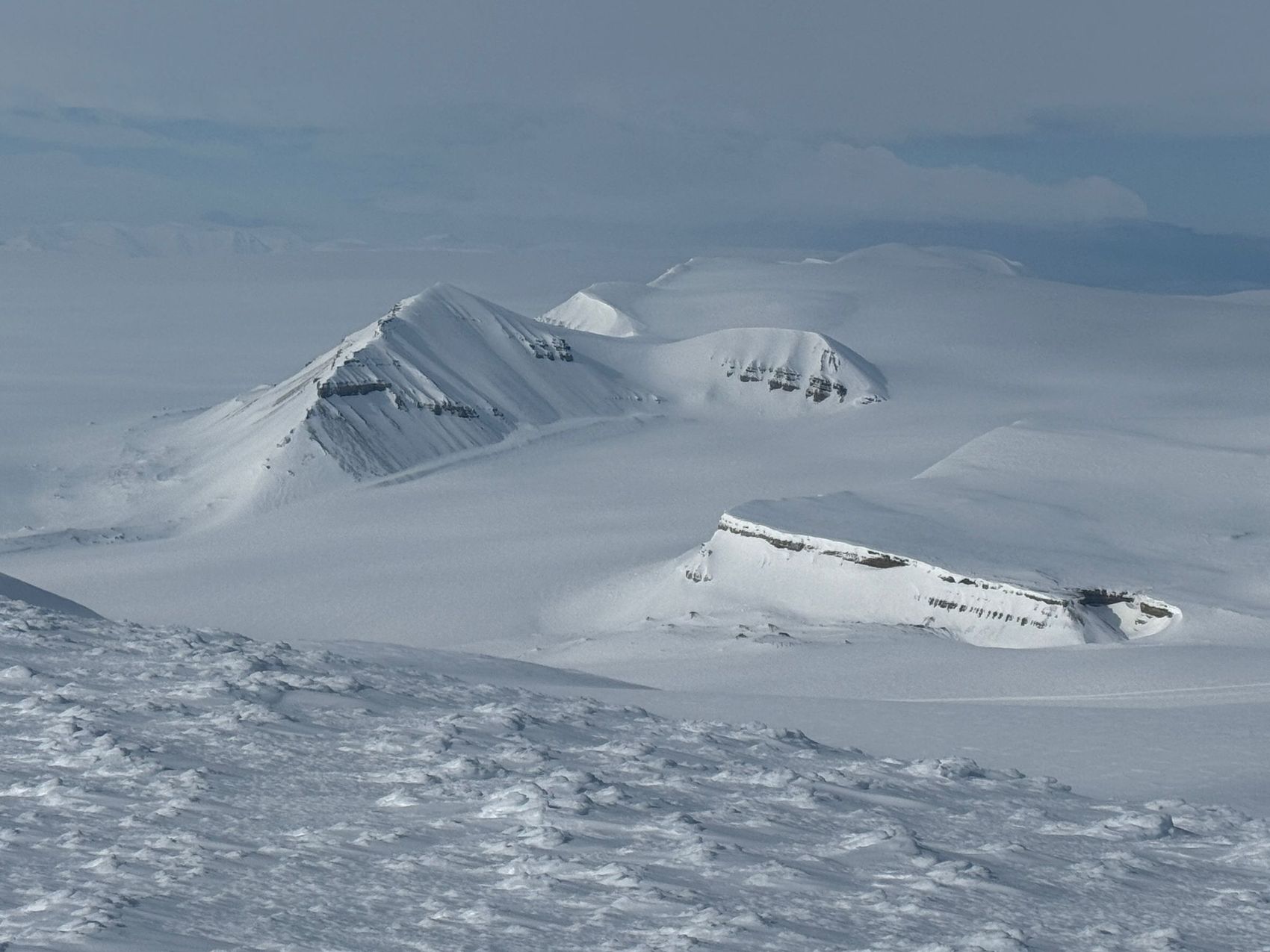 Snow-covered Svalbard peaks